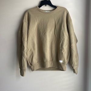 beige hollister crew-neck. men’s size small (oversized fit)